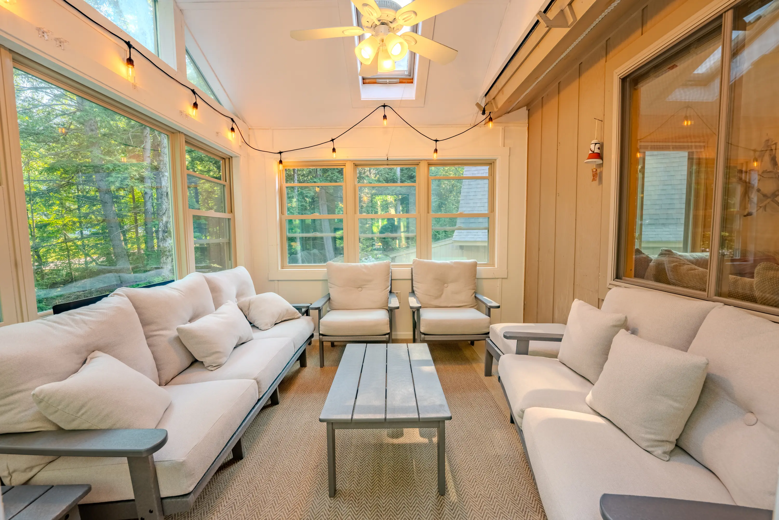 Three season sunroom overlooking the brook